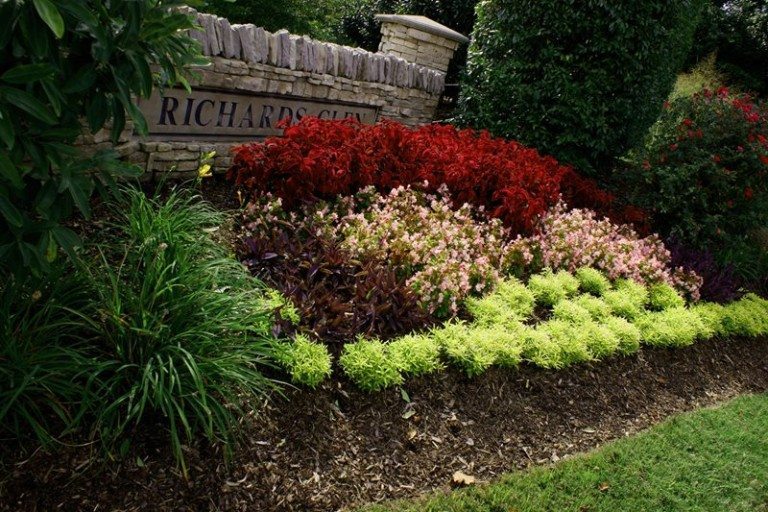 Landscaping by sign