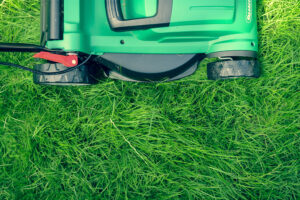 lawnmower running over lawn